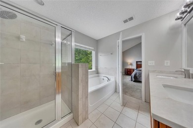 Located in Victoria Crossing, this end-unit townhome offers - photo 22