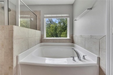 Located in Victoria Crossing, this end-unit townhome offers - photo 23