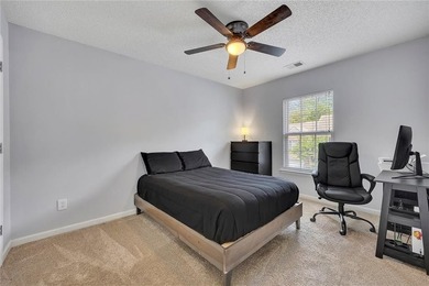 Located in Victoria Crossing, this end-unit townhome offers - photo 24