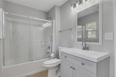 Located in Victoria Crossing, this end-unit townhome offers - photo 26