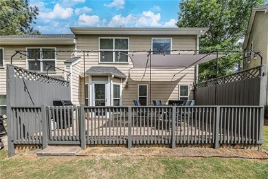 Located in Victoria Crossing, this end-unit townhome offers - photo 29