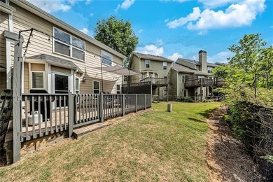 Located in Victoria Crossing, this end-unit townhome offers - photo 32