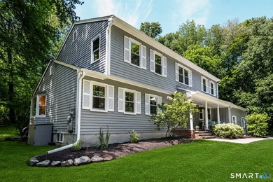 Turn Key 4 Bedroom,2.5 Bath Colonial privately set on 2 peaceful - photo 1