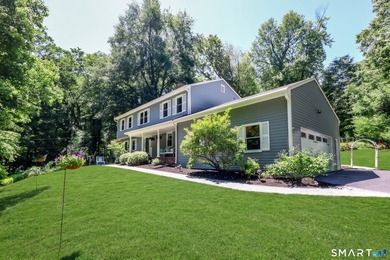 Turn Key 4 Bedroom,2.5 Bath Colonial privately set on 2 peaceful - photo 2