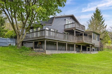 Set on 3 fully fenced acres with breathtaking year-round lake - photo 2