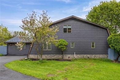 Set on 3 fully fenced acres with breathtaking year-round lake - photo 3