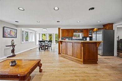 Set on 3 fully fenced acres with breathtaking year-round lake - photo 4
