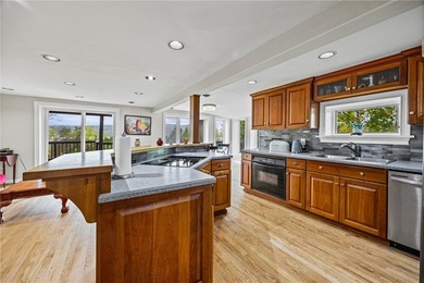 Set on 3 fully fenced acres with breathtaking year-round lake - photo 8