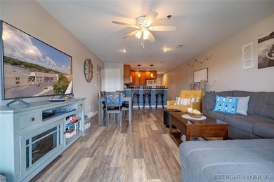 Welcome to this beautifully remodeled, walk-in end unit at The - photo 2