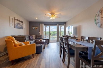 Welcome to this beautifully remodeled, walk-in end unit at The - photo 5