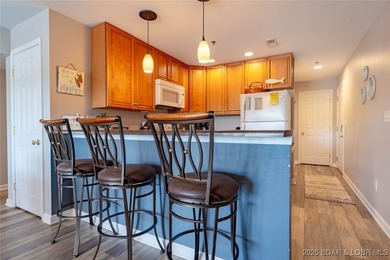 Welcome to this beautifully remodeled, walk-in end unit at The - photo 10