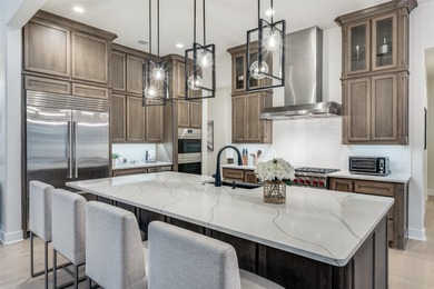 Completed in 2025, this exceptional Toll Brothers residence - photo 10
