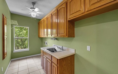 Experience elevated lake living in this stunning three-story - photo 15