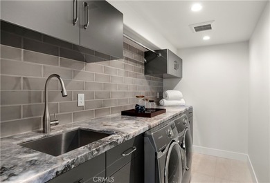 Sited at the very end of North Portola, this custom home sits at - photo 31