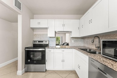 Beautifully renovated 2nd-floor corner unit in the highly - photo 11