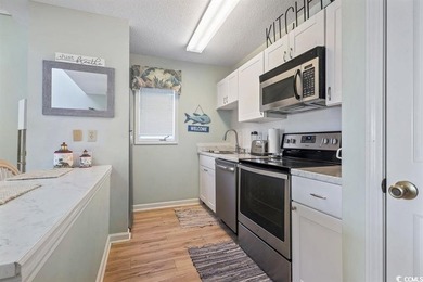 This freshly painted furnished 2-bedroom, 2-bathroom condo with - photo 13