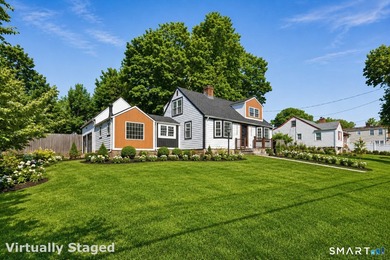 Completely renovated from top to bottom, this stunning 4-bedroom - photo 1