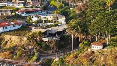 Poised at the end of a private, ocean front cul de sac in the - photo 11