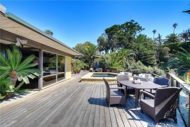 Poised at the end of a private, ocean front cul de sac in the - photo 16
