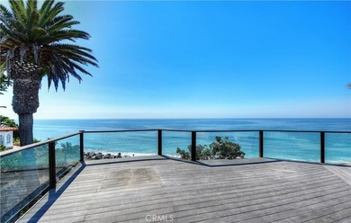 Poised at the end of a private, ocean front cul de sac in the - photo 20