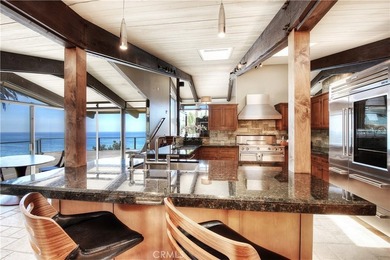 Poised at the end of a private, ocean front cul de sac in the - photo 26