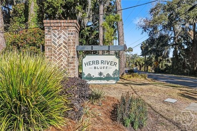 Enjoy modern low-maintenance living in the gated Herb River - photo 34