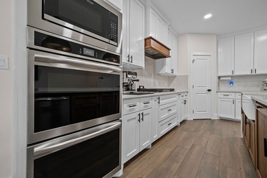This stunning 2024-built home perfectly blends modern style - photo 10