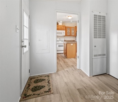 Tucked away on a beautiful 1.06-acre lot, this home invites you