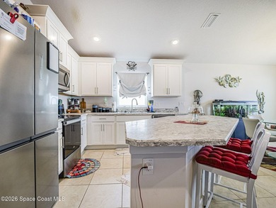 Welcome home to this beautifully maintained 3-bedroom, 2-bath - photo 3