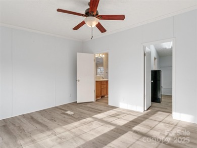 Tucked away on a beautiful 1.06-acre lot, this home invites you