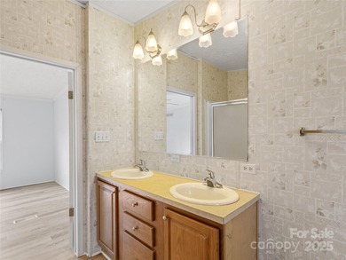 Tucked away on a beautiful 1.06-acre lot, this home invites you