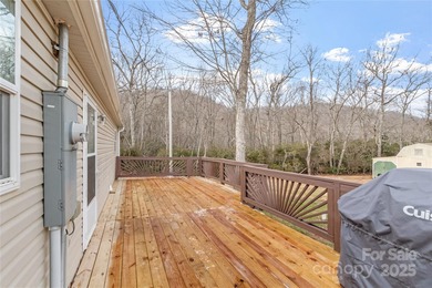 Tucked away on a beautiful 1.06-acre lot, this home invites you