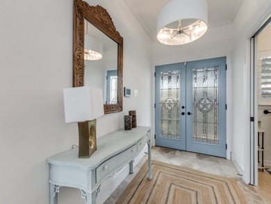 Nestled in the highly sought-after Waters Edge community - photo 3