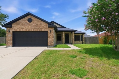 NEWLY renovated four-bedroom,two-bathroom split-plan home with - photo 2