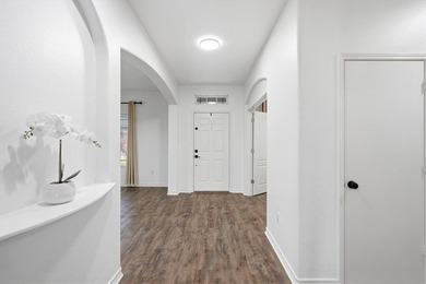 NEWLY renovated four-bedroom,two-bathroom split-plan home with - photo 4