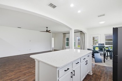 NEWLY renovated four-bedroom,two-bathroom split-plan home with - photo 7