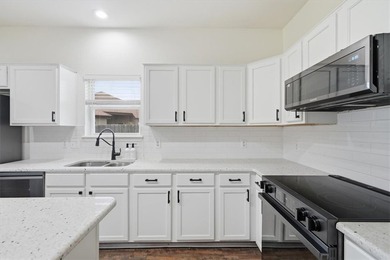 NEWLY renovated four-bedroom,two-bathroom split-plan home with - photo 10