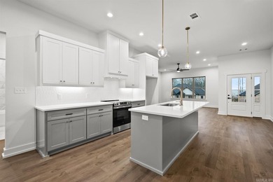 This beautifully constructed new home offers peaceful views of - photo 11