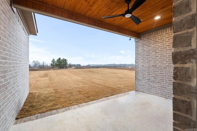 This beautifully constructed new home offers peaceful views of - photo 14