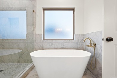 This beautifully constructed new home offers peaceful views of - photo 22