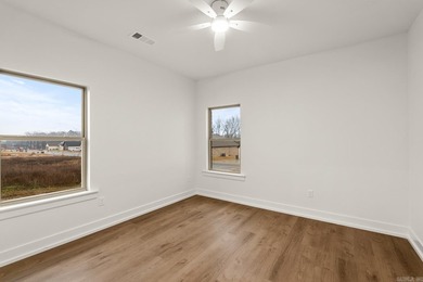 This beautifully constructed new home offers peaceful views of - photo 34