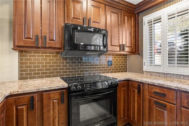 Experience tranquil lakeside living in this luxurious 3BR/3BA - photo 13