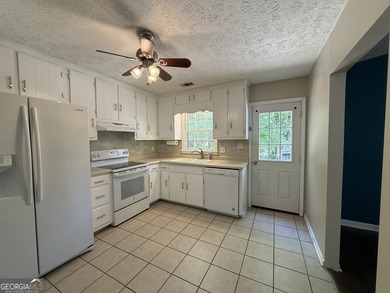 Welcome home to this charming, single-level ranch in The - photo 15