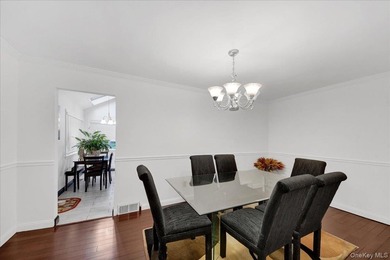WELCOME HOME!! This charming brick Cape Cod with - photo 16