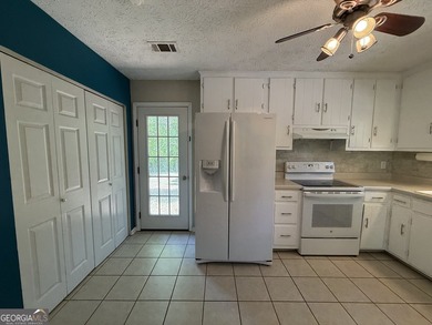 Welcome home to this charming, single-level ranch in The - photo 17