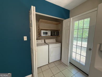 Welcome home to this charming, single-level ranch in The - photo 19