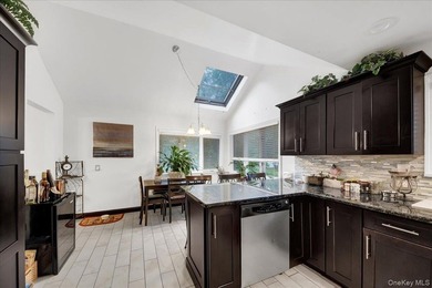 WELCOME HOME!! This charming brick Cape Cod with - photo 19