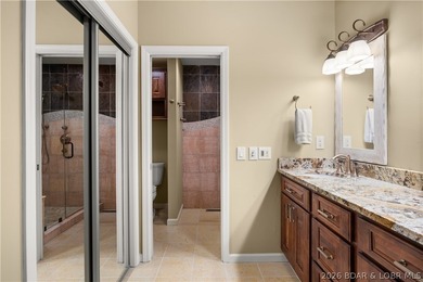 Experience tranquil lakeside living in this luxurious 3BR/3BA - photo 32