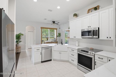 Beautifully landscaped and move-in ready, this home shows like - photo 7