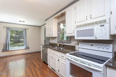 Nestled on more than an acre just beyond Raleigh's city limits - photo 15